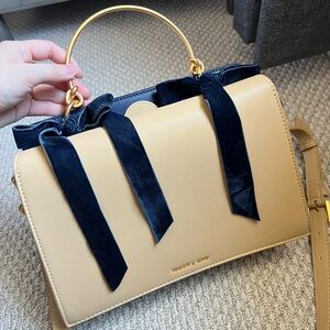 Charles & Keith Tan Crossbody Bag with Structured Design and Navy Velvet Ribands
